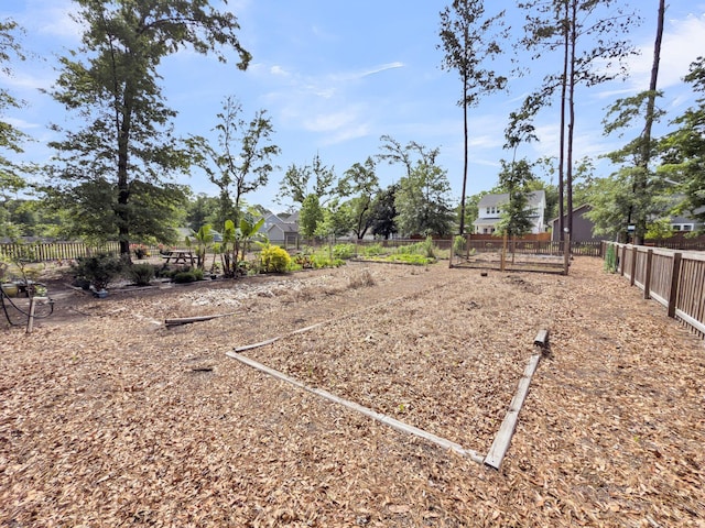view of yard featuring fence