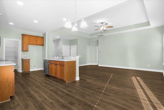 kitchen featuring dishwasher, ceiling fan with notable chandelier, sink, decorative light fixtures, and dark hardwood / wood-style flooring