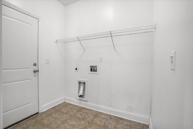 clothes washing area featuring hookup for a washing machine and hookup for an electric dryer