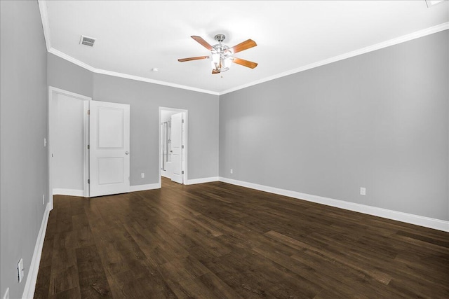 spare room featuring crown molding, ceiling fan, and dark hardwood / wood-style floors