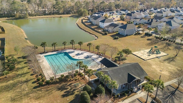 drone / aerial view with a water view