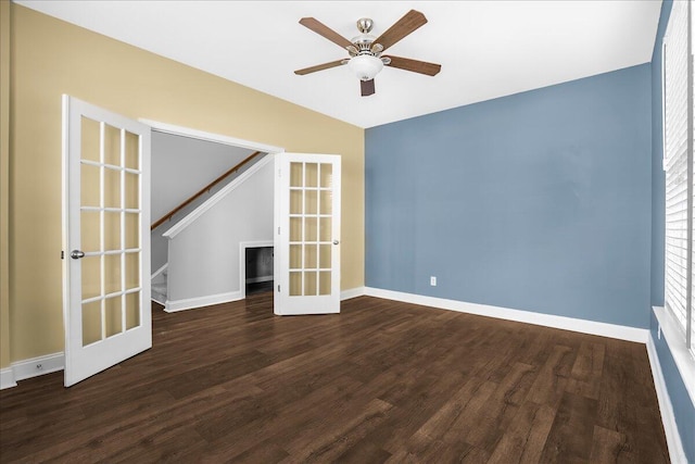 unfurnished room featuring french doors, vaulted ceiling, and dark wood-type flooring