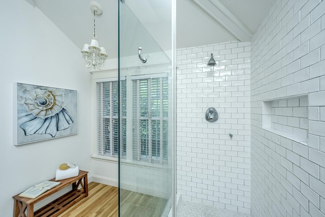 3002 Waterway Blvd, Isle Of Palms, SC 29451 - bathroom featuring tiled shower, wood finished floors, and a chandelier