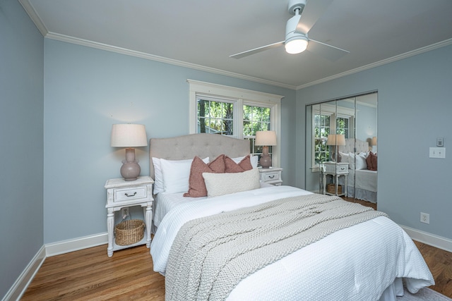 3002 Waterway Blvd, Isle Of Palms, SC 29451 - bedroom featuring ornamental molding, wood finished floors, a closet, and ceiling fan