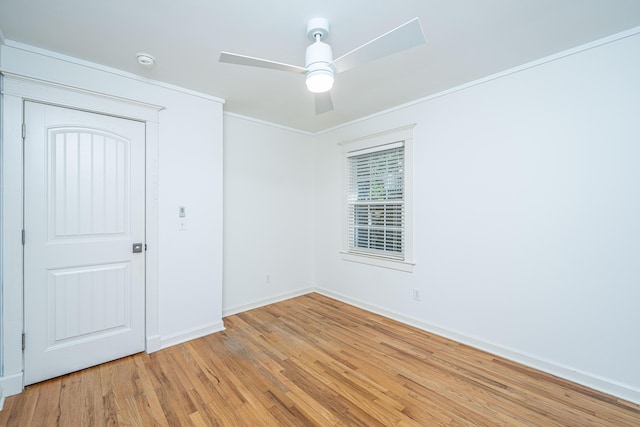 3002 Waterway Blvd, Isle Of Palms, SC 29451 - spare room featuring light wood-type flooring, a smoke detector, a ceiling fan, and crown molding