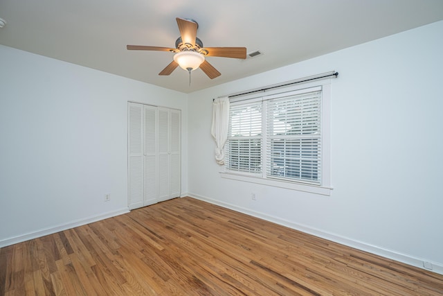 3002 Waterway Blvd, Isle Of Palms, SC 29451 - spare room featuring wood finished floors and ceiling fan