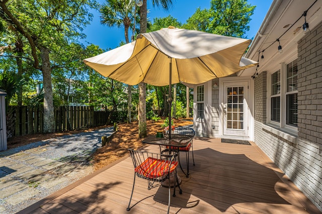 3002 Waterway Blvd, Isle Of Palms, SC 29451 - wooden terrace with outdoor dining area