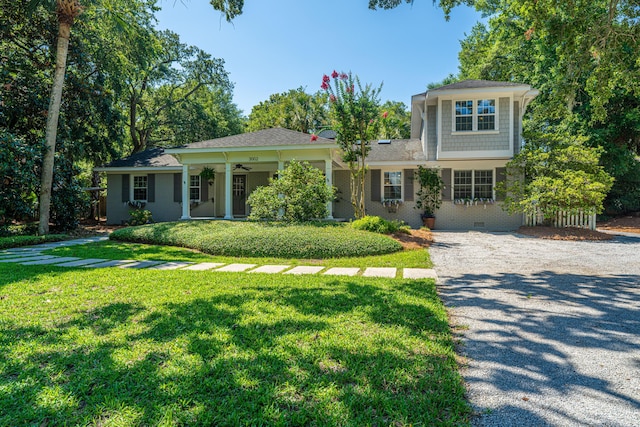 3002 Waterway Blvd, Isle Of Palms, SC 29451 - view of front of house with a front yard and gravel driveway