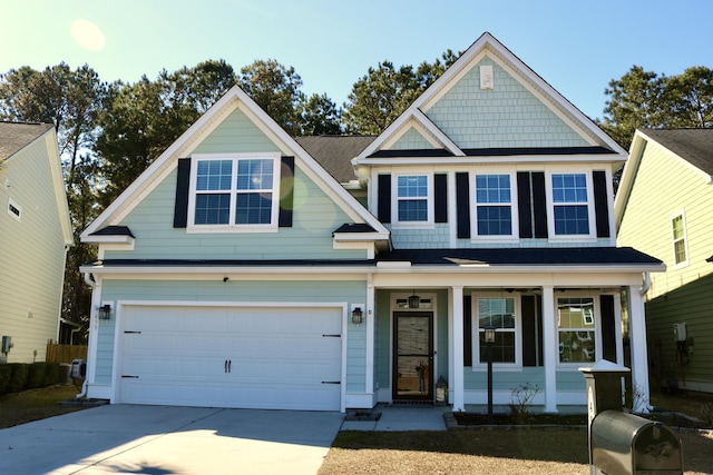 craftsman house featuring a porch and a garage