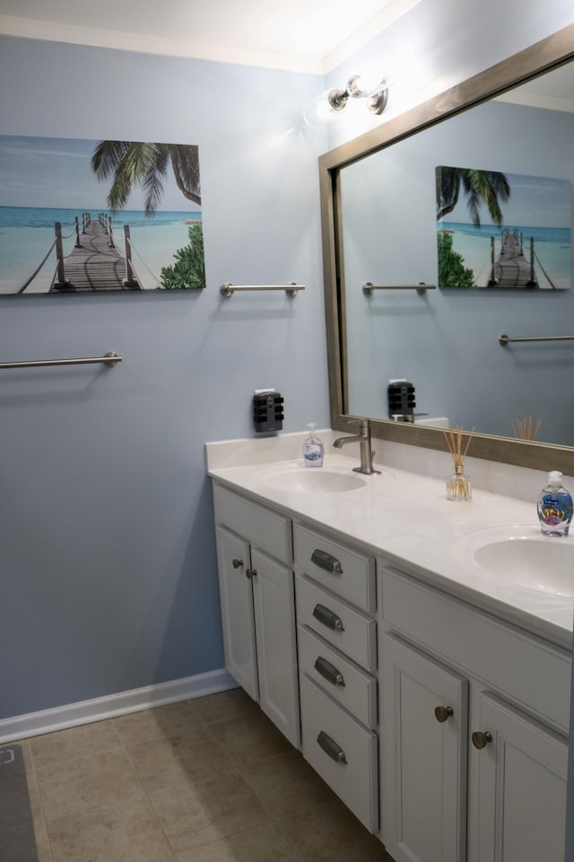 bathroom with vanity and ornamental molding