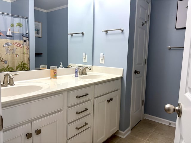 bathroom with vanity, tile patterned floors, and ornamental molding