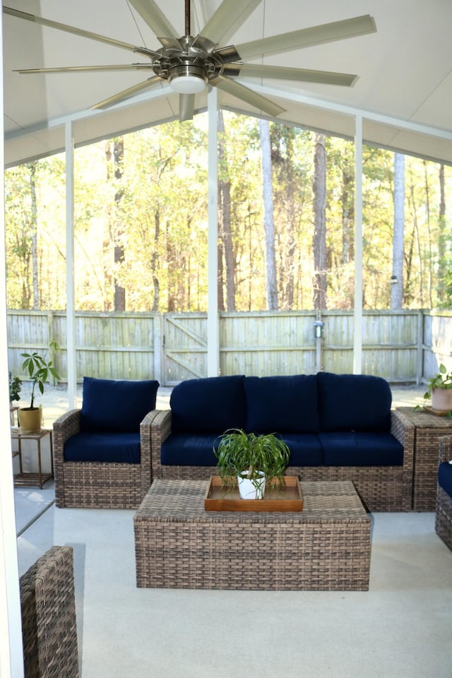 sunroom / solarium with ceiling fan