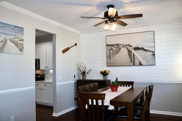 dining area with ceiling fan, crown molding, and dark hardwood / wood-style flooring