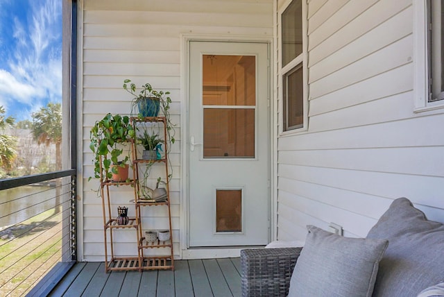 property entrance with a balcony