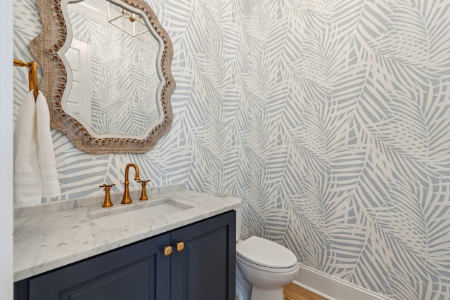 3894 Sawyers Island Dr, Mount Pleasant, SC 29466 - bathroom featuring wallpapered walls, toilet, and vanity