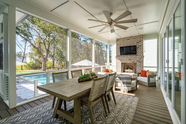3894 Sawyers Island Dr, Mount Pleasant, SC 29466 - sunroom featuring a ceiling fan and a fireplace