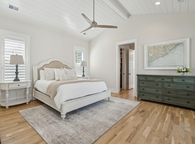 3894 Sawyers Island Dr, Mount Pleasant, SC 29466 - bedroom with baseboards, vaulted ceiling with beams, visible vents, and light wood-style floors