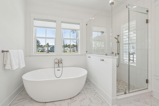 3894 Sawyers Island Dr, Mount Pleasant, SC 29466 - full bath with a soaking tub, marble finish floor, a stall shower, and baseboards