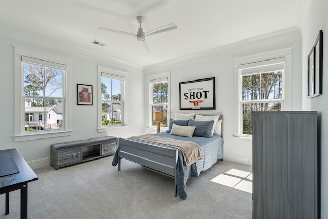 3894 Sawyers Island Dr, Mount Pleasant, SC 29466 - carpeted bedroom with multiple windows, visible vents, crown molding, and a ceiling fan