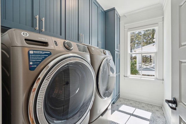 3894 Sawyers Island Dr, Mount Pleasant, SC 29466 - laundry area featuring baseboards, washing machine and dryer, and cabinet space