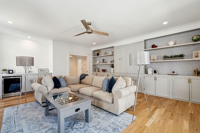3894 Sawyers Island Dr, Mount Pleasant, SC 29466 - living room with ornamental molding, ceiling fan, wine cooler, recessed lighting, and light wood-style floors