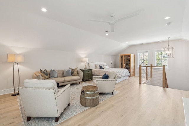 3894 Sawyers Island Dr, Mount Pleasant, SC 29466 - bedroom with lofted ceiling, recessed lighting, ceiling fan with notable chandelier, and light wood finished floors