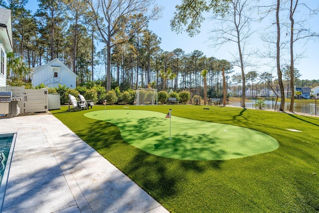 3894 Sawyers Island Dr, Mount Pleasant, SC 29466 - exterior space with fence, view of golf course, a yard, and a patio area