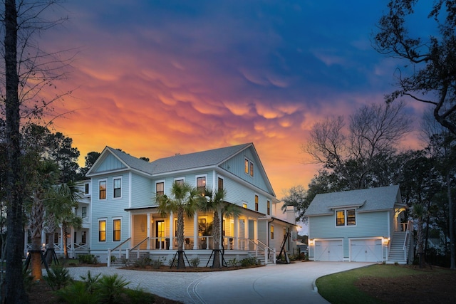 3894 Sawyers Island Dr, Mount Pleasant, SC 29466 - view of front facade with covered porch, driveway, and an attached garage