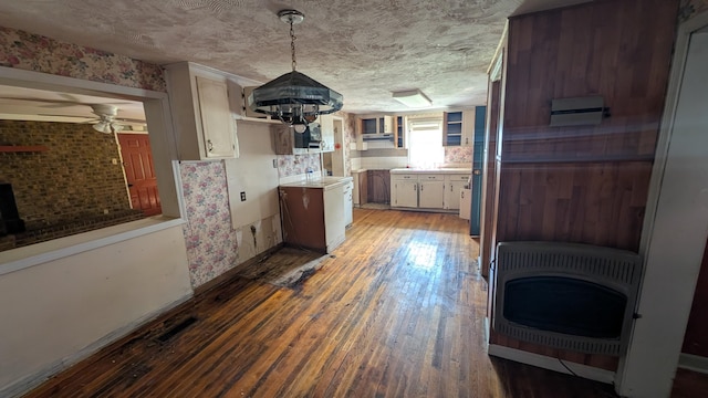 116 Stillfield Dr, Moncks Corner, SC 29461 - kitchen featuring heating unit, hardwood / wood-style flooring, light countertops, a textured ceiling, and ceiling fan