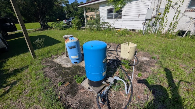116 Stillfield Dr, Moncks Corner, SC 29461 - exterior view of a water pressure tank and electric meter