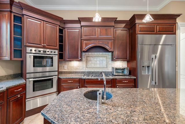 kitchen featuring crown molding, sink, light tile patterned floors, tasteful backsplash, and stainless steel appliances