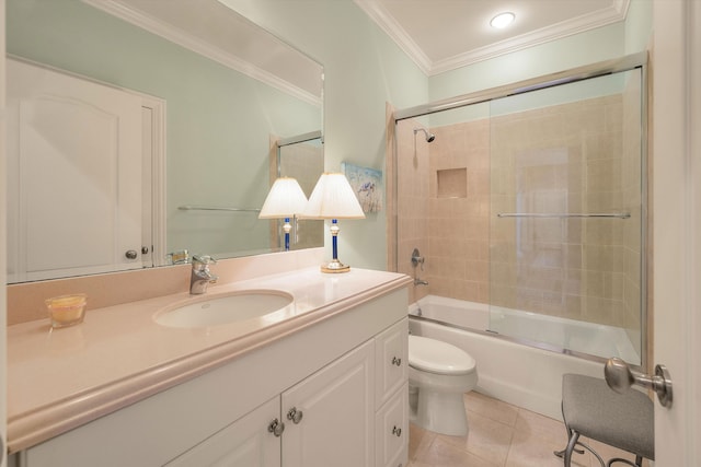 full bathroom featuring tile patterned flooring, enclosed tub / shower combo, crown molding, toilet, and vanity