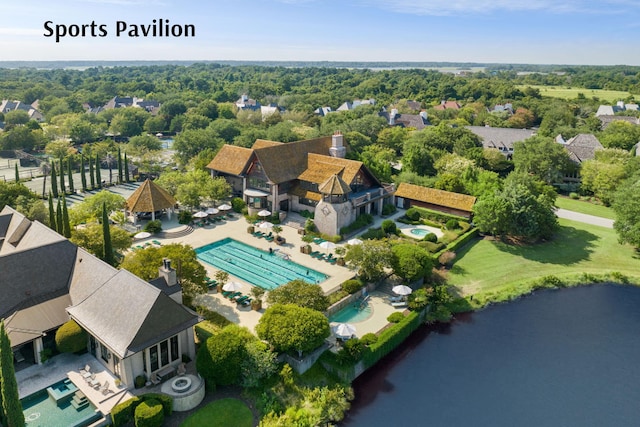 birds eye view of property with a water view