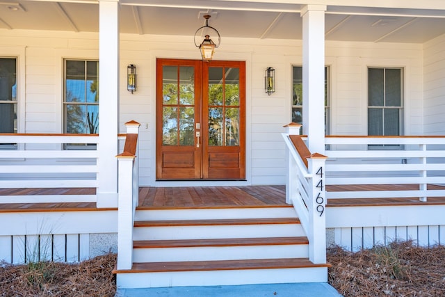 entrance to property with a porch