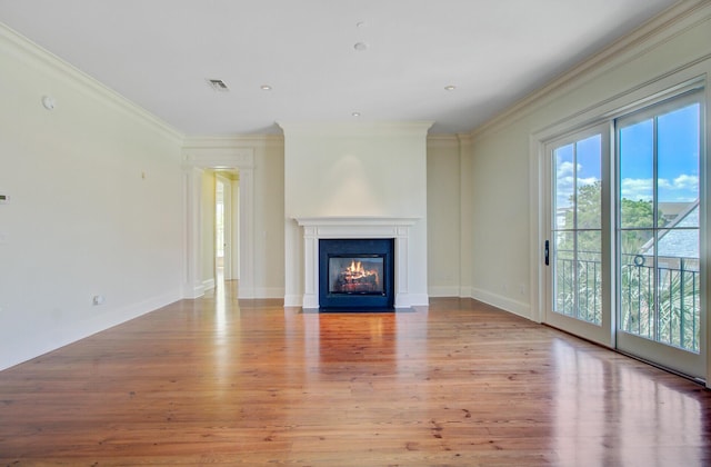 1 Vendue Range Range Unit I, Charleston, SC 29401 - unfurnished living room with wood finished floors, ornamental molding, a fireplace with flush hearth, and baseboards
