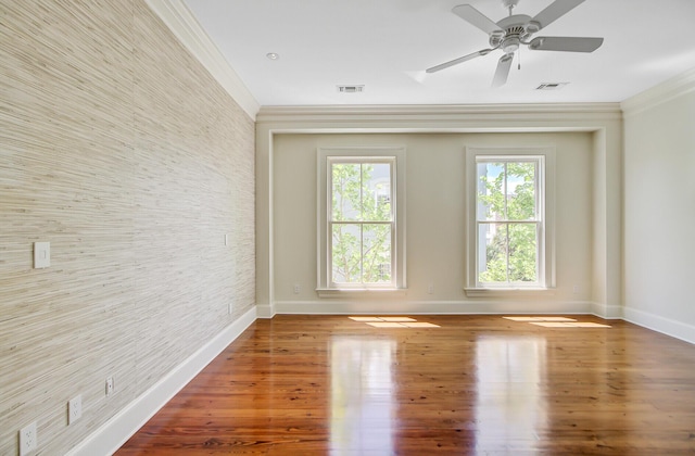 1 Vendue Range Range Unit I, Charleston, SC 29401 - spare room featuring crown molding, wood finished floors, a ceiling fan, and baseboards