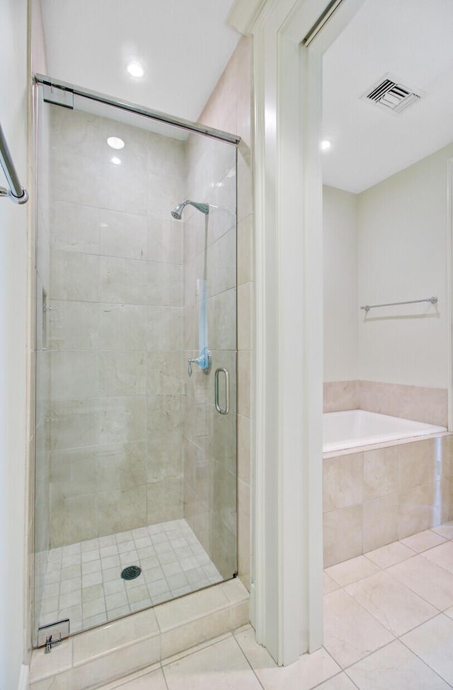 1 Vendue Range Range Unit I, Charleston, SC 29401 - full bath with tile patterned floors, a stall shower, a garden tub, and recessed lighting