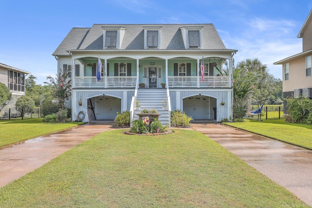 view of front of property featuring a porch, a front lawn, and a carport