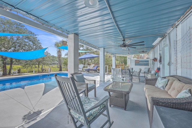 view of patio featuring an outdoor living space and ceiling fan