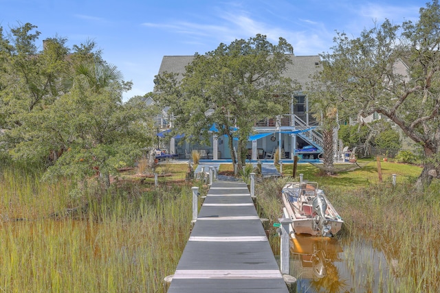 dock area featuring a water view