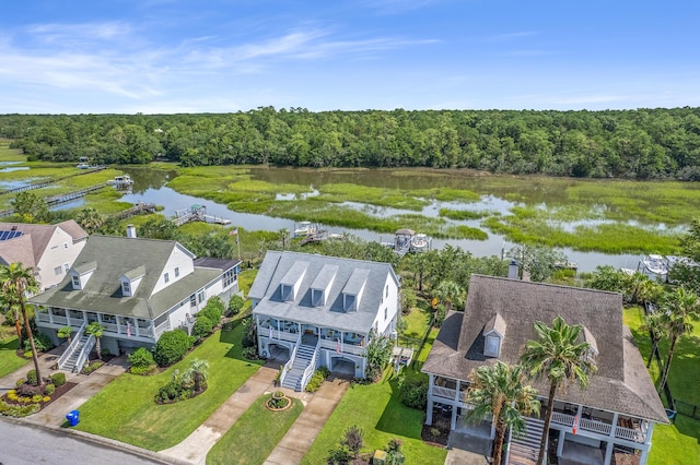 bird's eye view with a water view