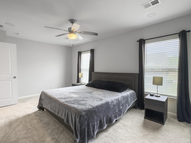 bedroom featuring carpet flooring, baseboards, and ceiling fan