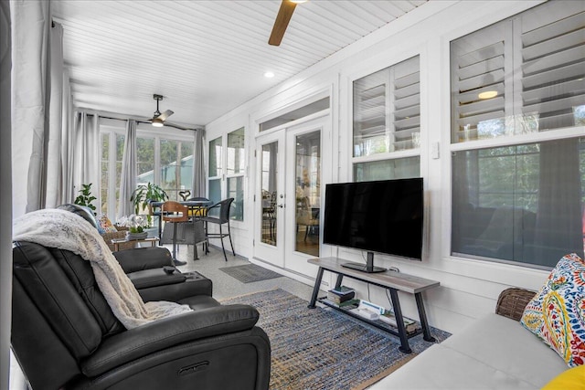 sunroom with french doors and carpet