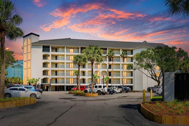 9002 Palmetto Dr Unit 420, Isle Of Palms, SC 29451 - property at dusk with uncovered parking
