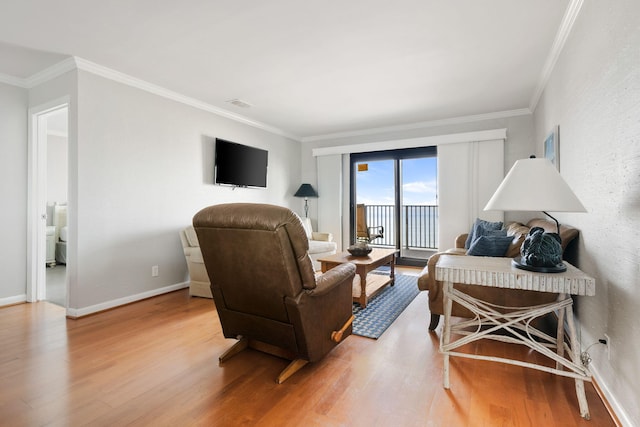9002 Palmetto Dr Unit 420, Isle Of Palms, SC 29451 - living room with wood finished floors, crown molding, and baseboards