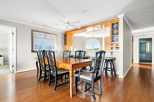 9002 Palmetto Dr Unit 420, Isle Of Palms, SC 29451 - dining area with ornamental molding, a ceiling fan, wood finished floors, baseboards, and recessed lighting