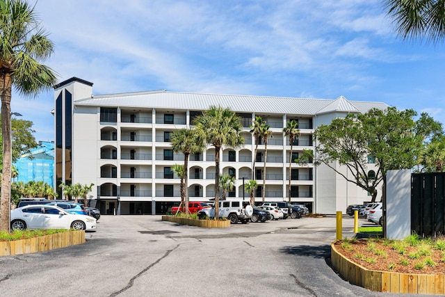 9002 Palmetto Dr Unit 420, Isle Of Palms, SC 29451 - view of apartment building / complex with uncovered parking