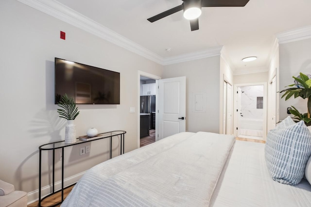 bedroom featuring connected bathroom, wood-type flooring, refrigerator, ornamental molding, and ceiling fan