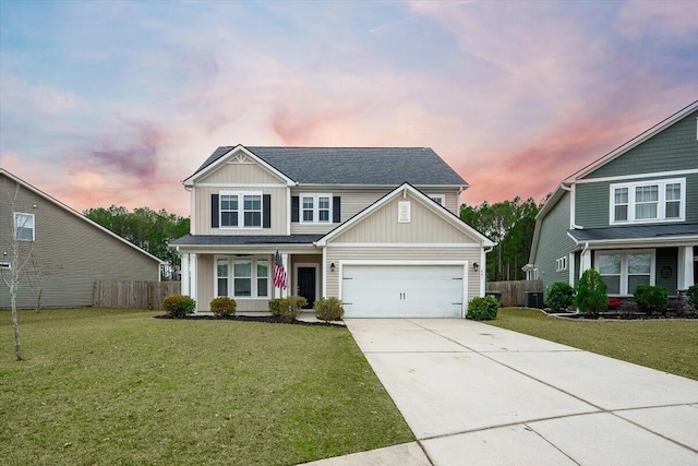 craftsman house with a garage, central AC unit, and a lawn