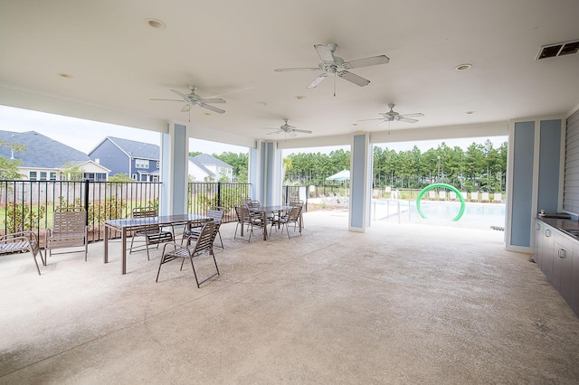 view of patio with ceiling fan